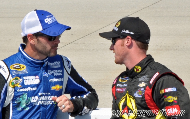 Jimmie Johnson imparts wisdom to a young Truck driver.jpg